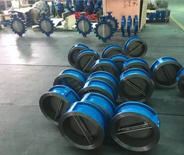 A check valve, also known as a non-return valve or one-way valve, is a mechanical device designed to allow fluid (liquid or gas) to flow in only one direction while preventing reverse flow (backflow) in a system. It operates based on the pressure of the fluid within the system. When fluid flows in the intended direction, it pushes against a movable part, such as a disc, ball, or diaphragm, within the valve. This action opens the valve, allowing the fluid to pass through. If the fluid attempts to flow in the reverse direction, the pressure drops, causing the movable part to close and seal off the flow path. This mechanism is powered by the fluid itself, eliminating the need for an external power source.